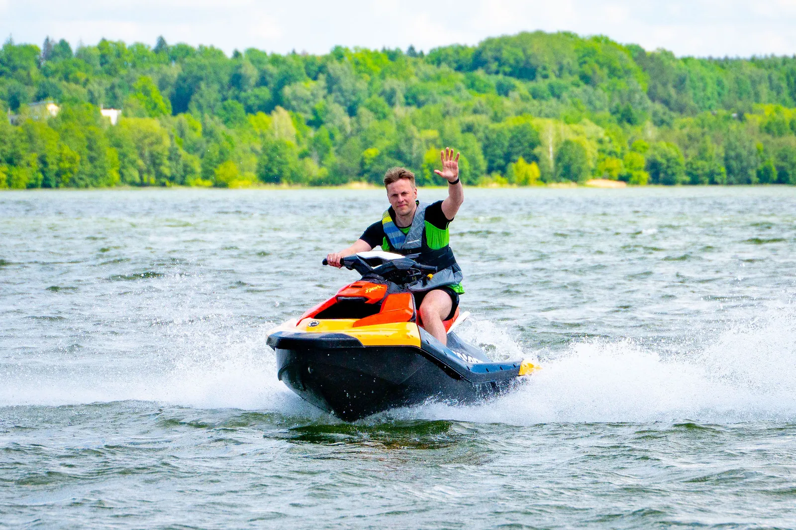 Team-building event participants with jet skis on Lake Elektrėnai